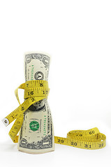 Image showing One dollars US money in measuring tape