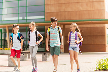 Image showing group of happy elementary school students walking