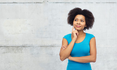 Image showing happy afro american young woman over white