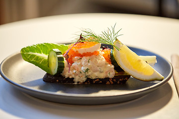 Image showing close up of toast skagen with caviar and bread