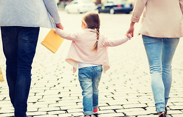 Image showing close up of family with child shopping in city