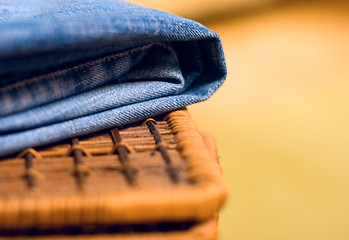 Image showing jeans atop of a basket