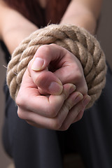 Image showing Blindfolded hands woman with rope