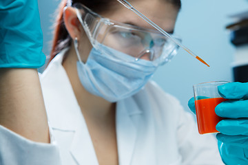 Image showing Lab technician in mask , goggles