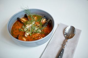 Image showing seafood soup with fish and blue mussels in bowl