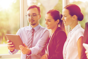 Image showing business people with tablet pc computer at office