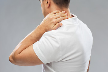 Image showing close up of man suffering from neck pain