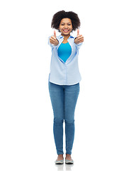 Image showing happy african american woman showing thumbs up