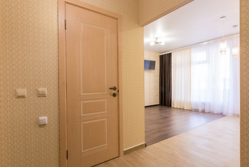 Image showing Interior studio, view from the front door to the room and the bathroom door