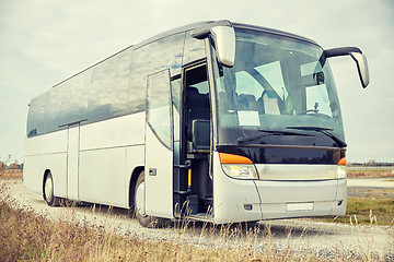 Image showing tour bus staying outdoors