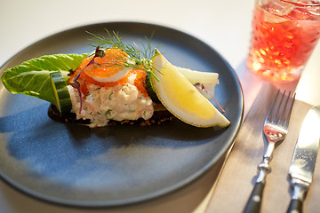 Image showing close up of toast skagen with caviar and bread