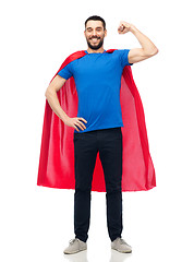 Image showing happy man in red superhero cape