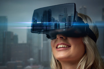 Image showing woman in virtual reality headset over city