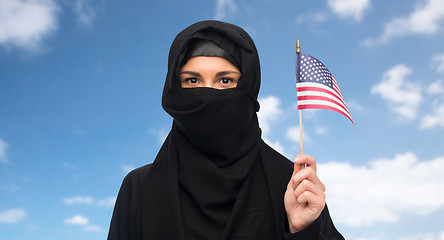 Image showing muslim woman in hijab with american flag