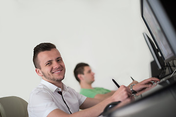 Image showing a group of graphic designers at work