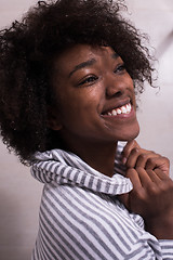 Image showing beautiful black woman wearing  bathrobe