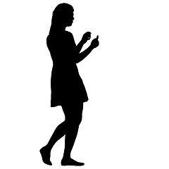 Image showing Black silhouettes of beautiful woman on white background. illustration