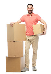 Image showing happy man with cardboard boxes