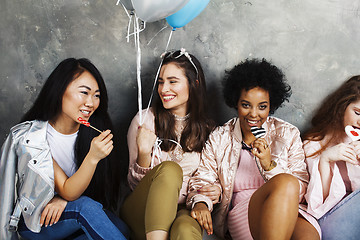 Image showing Lifestyle and people concept: young pretty diversity nations woman with different age children celebrating on birth day party together happy smiling, making selfie. African-american, asian and caucasi