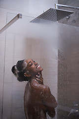 Image showing African American woman in the shower