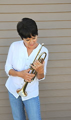 Image showing Female trumpet player.