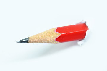 Image showing Red pencil and white torn paper