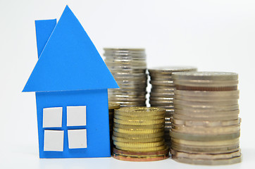 Image showing House model and stacks of coins