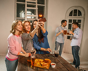 Image showing Group of friends girls making selfie photo