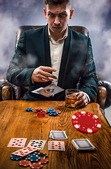 Image showing The chips for gamblings, drink and playing cards