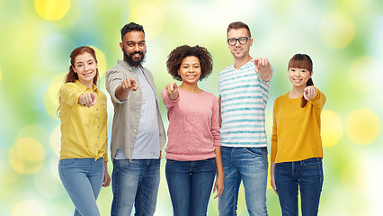 Image showing international group of people pointing on you