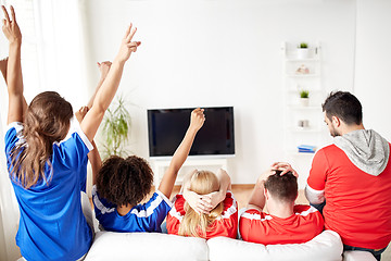 Image showing friends or football fans watching tv at home