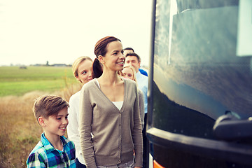 Image showing group of happy passengers boarding travel bus