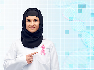 Image showing muslim doctor with breast cancer awareness ribbon