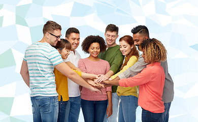 Image showing international group of happy people holding hands