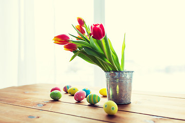 Image showing close up of easter eggs and flowers in bucket