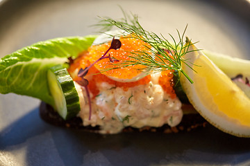 Image showing close up of toast skagen with caviar and bread