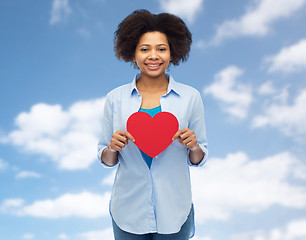 Image showing happy african american woman with red heart shape