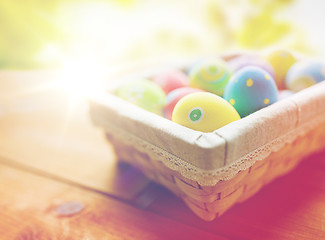 Image showing close up of colored easter eggs in basket