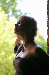 Image showing Silhouette of a Young Woman With Cleavage