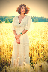 Image showing charming woman dressed in white