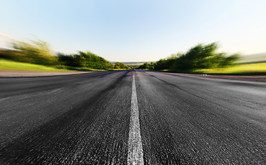 Image showing road through the green field