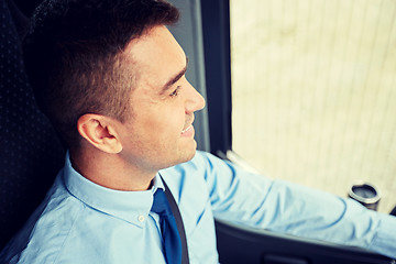 Image showing close up of happy bus driver or businessman