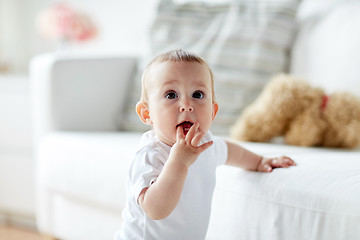 Image showing happy little baby boy or girl at home