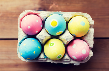 Image showing close up of colored easter eggs in egg box