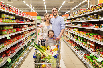 Image showing family with food in shopping cart at grocery store