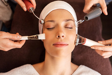 Image showing woman having hydradermie facial treatment in spa