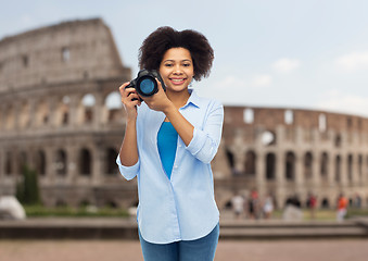 Image showing happy afro american woman with digital camera