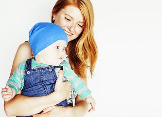 Image showing young beauty mother with cute baby, red head happy modern family