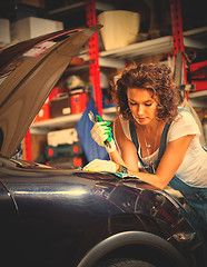 Image showing woman car mechanic in a garage