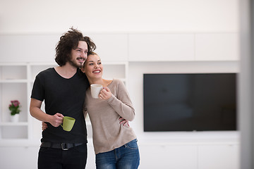 Image showing Happy couple in their new home